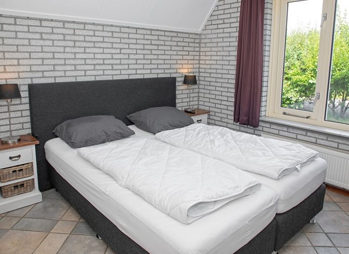 Modern kitchen in Holiday home Schelpenoord 121, De Cocksdorp Texel, fully equipped for a comfortable stay.