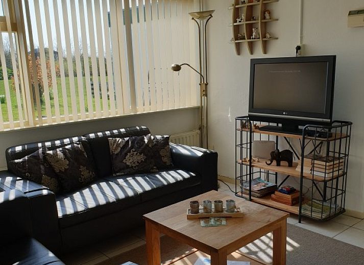 Rustic cottage at Holiday Homes Family Bouthoorn in South Eierland, Texel with a beautiful view of the countryside.