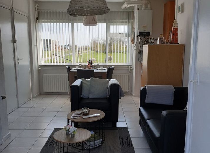Cozy terrace with flowers at Holiday Homes Family Bouthoorn in Zuid-Eierland, Texel.