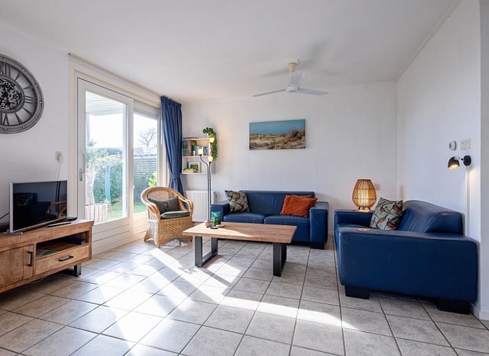 Vakantiehuis Slufterduin 52a in De Cocksdorp, Texel met zonnig terras en groene tuin.