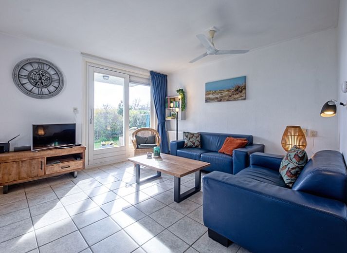 Vakantiehuis Slufterduin 52a in De Cocksdorp, Texel met zonnig terras en groene tuin.