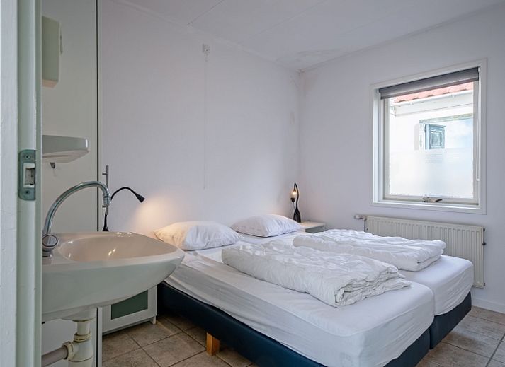 Gezellige woonkamer in Vakantiehuis Slufterduin 52a, De Cocksdorp, Texel met comfortabele zithoek.