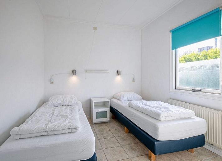 Gezellige woonkamer in Vakantiehuis Slufterduin 52a, De Cocksdorp, Texel met comfortabele zithoek.