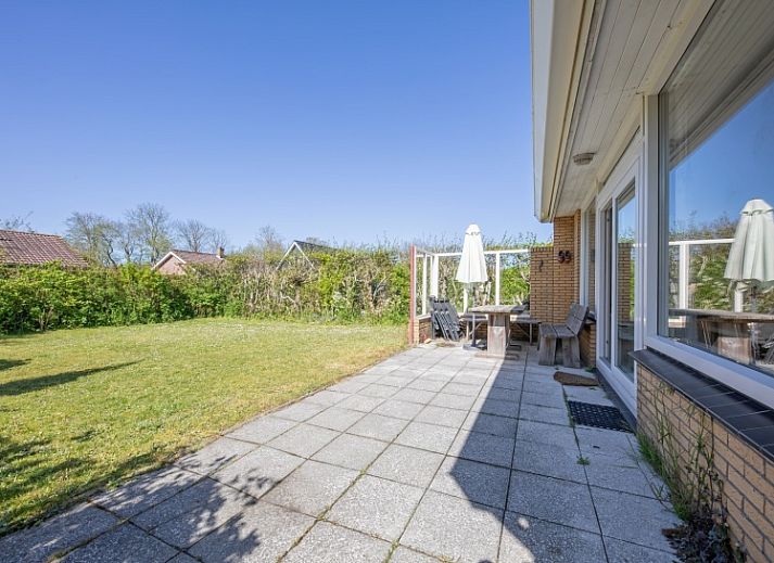 Stilvolle Sitzecke im Ferienhaus Slufterhoek 078, De Cocksdorp, ideal zum Entspannen.