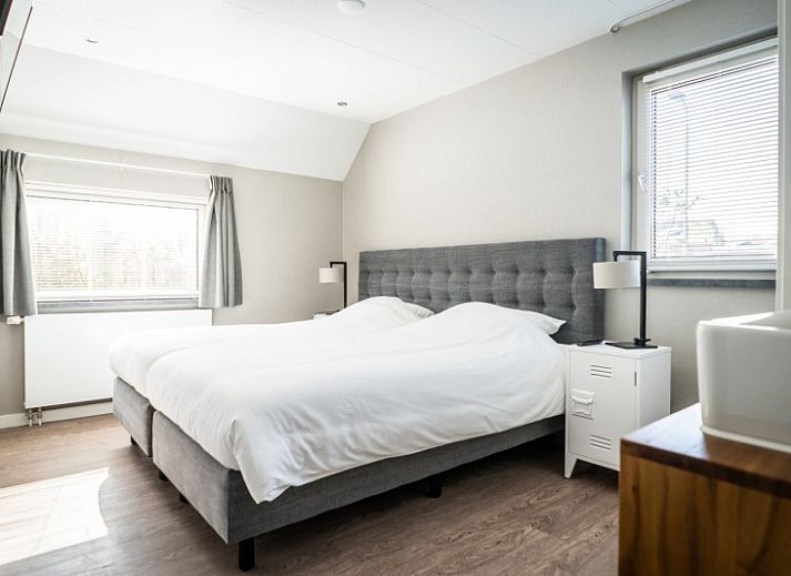Entrance and laundry room of Type B-10 Hodshonstraat vacation home in De Cocksdorp, Texel, comfortable stay on the Wadden Islands.
