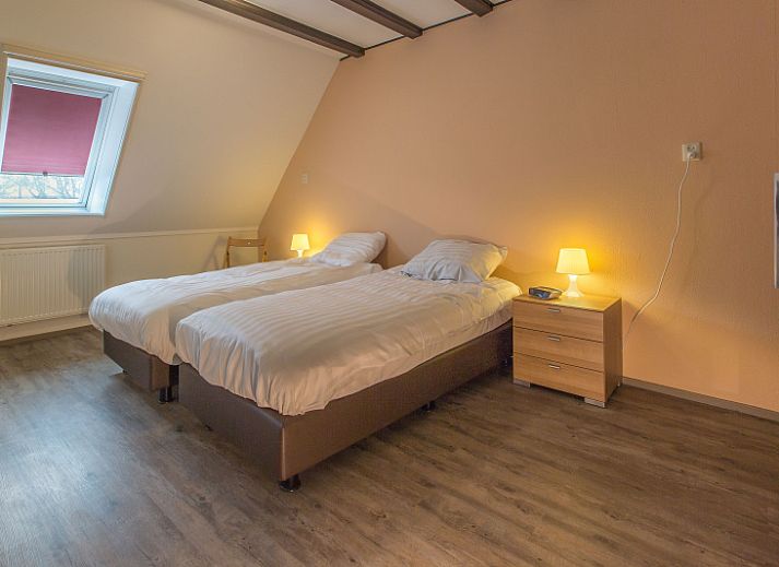 Gezellige woonkamer van Type S-2 vakantiehuis in De Cocksdorp, Texel met comfortabele zitruimte.