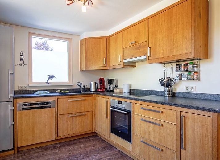 Grosszuegiger Aussenbereich im Ferienhaus Ganzenvlucht, De Cocksdorp, Texel, ideal zum Entspannen in der Natur.