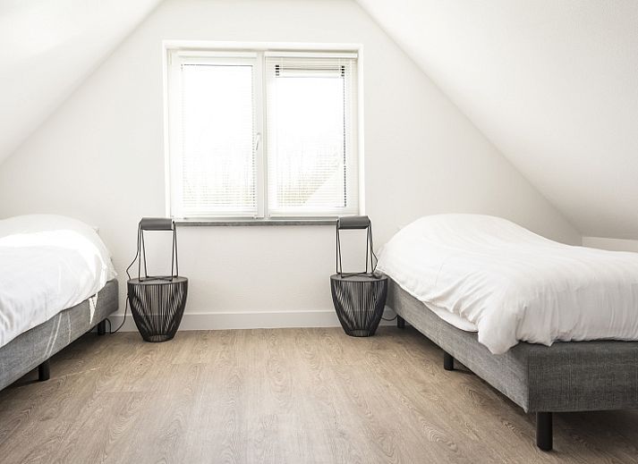 Moderne Kueche und Wohnzimmer des Landhuis Typ K, Ferienhaus in De Cocksdorp, Texel.