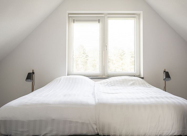 Moderne Kueche und Wohnzimmer des Landhuis Typ K, Ferienhaus in De Cocksdorp, Texel.