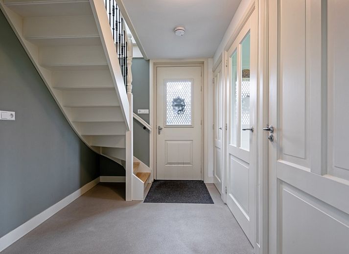 Gemuetliches Wohnzimmer im Bungalow Postweg 109, De Cocksdorp, Texel. Gemuetliche Sitzecke, ideal zum Entspannen auf den Watteninseln.