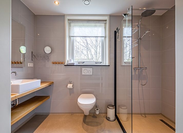 Gemuetliches Wohnzimmer im Bungalow Postweg 109, De Cocksdorp, Texel. Gemuetliche Sitzecke, ideal zum Entspannen auf den Watteninseln.