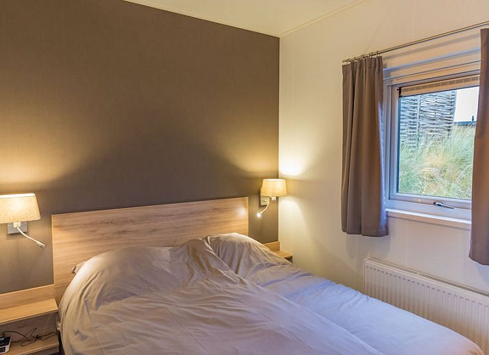 Chalet 05 Nevada in De Cocksdorp Texel met modern terras en tuin, ideaal vakantiehuis op Waddeneilanden.