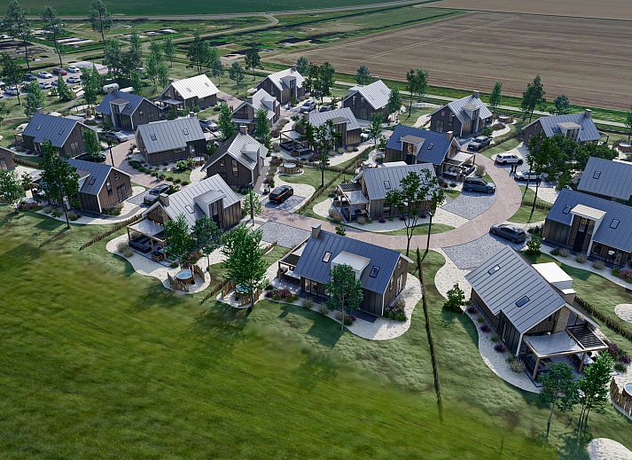 Uitzicht op de tuin en hot tub bij Chalet in De Cocksdorp, Texel, Waddeneilanden.