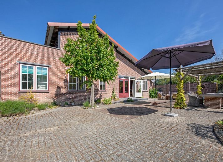 Paal 86 Texel Ferienhaus in De Cocksdorp mit grossem Garten und moderner Architektur.