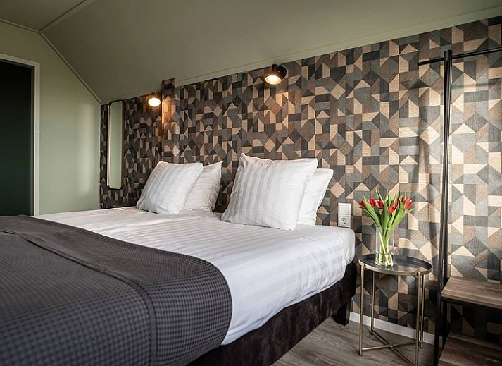 Guest house 0101821 - Holiday property Texel - Tweepersoonskamer met uitzicht op de tuin