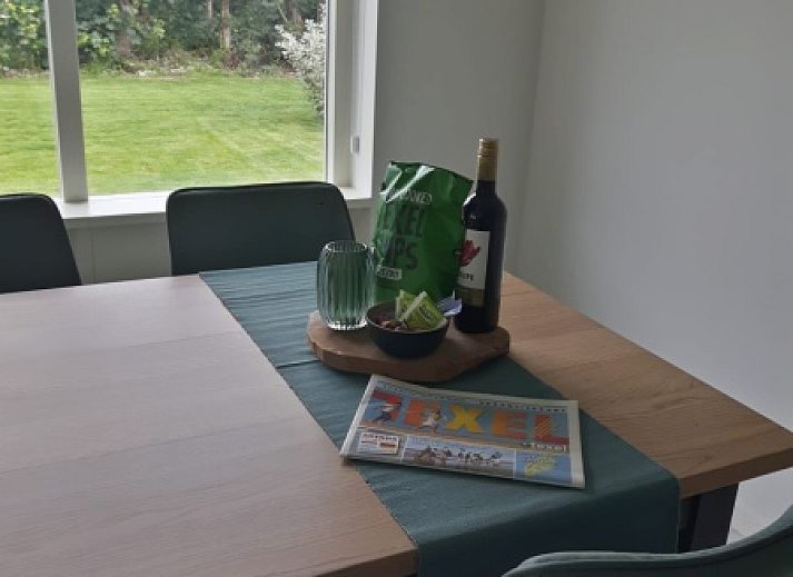 Bungalowpark Slufteroord - Duinzicht de Slufter in De Cocksdorp Texel, Ferienhaus mit sonniger Terrasse und gruenem Garten.