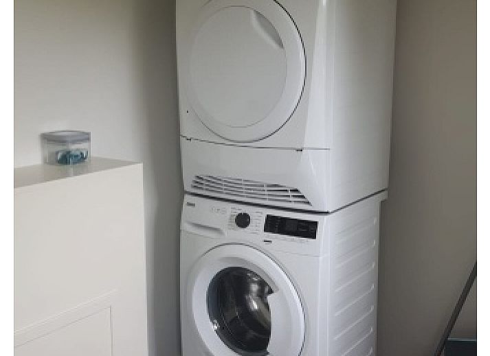 Stilvolles Wohnzimmer im Bungalowpark Slufteroord - Duinzicht de Slufter, De Cocksdorp Texel, mit moderner Einrichtung und grosszuegiger Aufteilung.