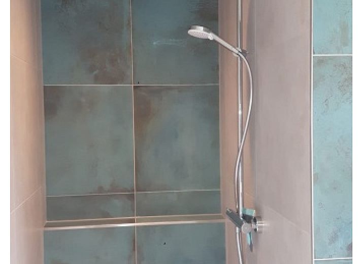 Stilvolles Wohnzimmer im Bungalowpark Slufteroord - Duinzicht de Slufter, De Cocksdorp Texel, mit moderner Einrichtung und grosszuegiger Aufteilung.