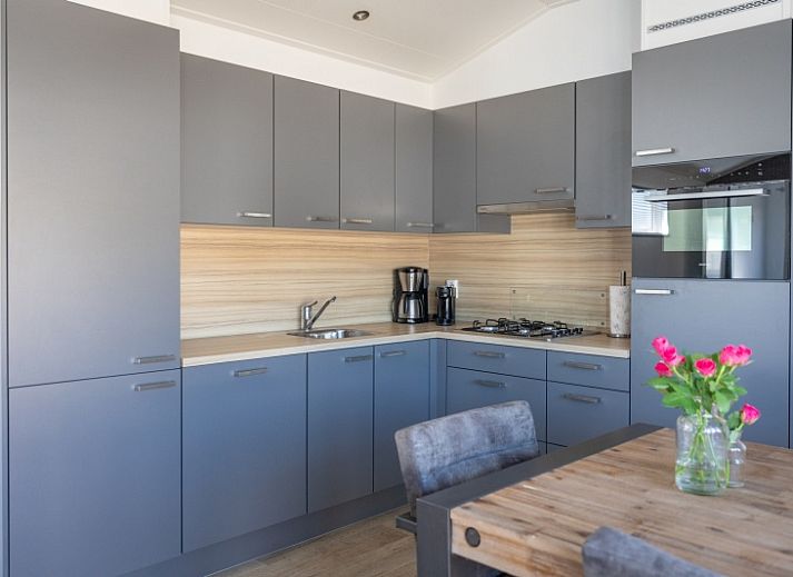 Chalet Bregkoog 231 in De Koog, Texel with spacious terrace and modern look at Chaletpark Bregkoog.