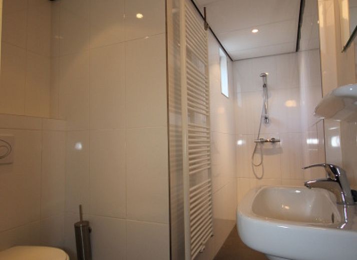 Cozy living room of Landhuis Landleven No. 81, vacation home in De Koog, Texel with comfortable interior.