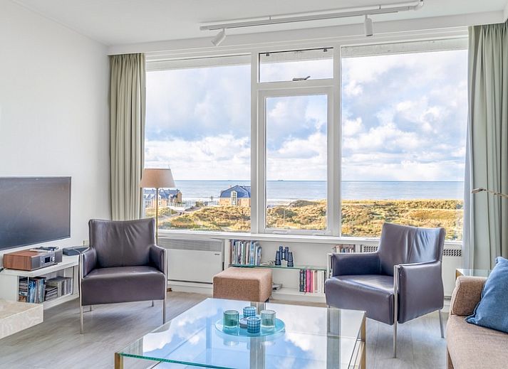 Apartment Juliana 160 Zeezicht in De Koog, Texel offers a beautiful view of the sea from the comfortable living room.