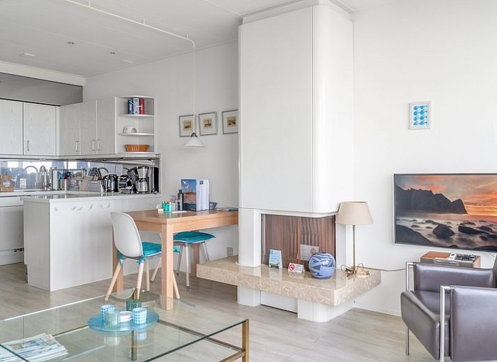 Apartment Juliana 160 Zeezicht in De Koog, Texel offers a beautiful view of the sea from the comfortable living room.