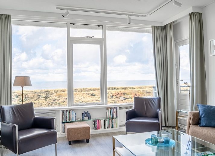 Apartment Juliana 160 Zeezicht in De Koog, Texel offers a beautiful view of the sea from the comfortable living room.