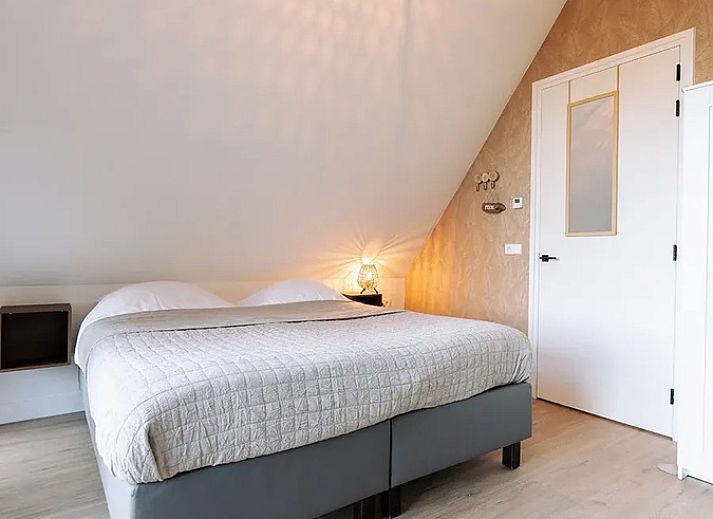 Stylish dining room in Holiday home Noordwester, De Koog Texel with modern furniture