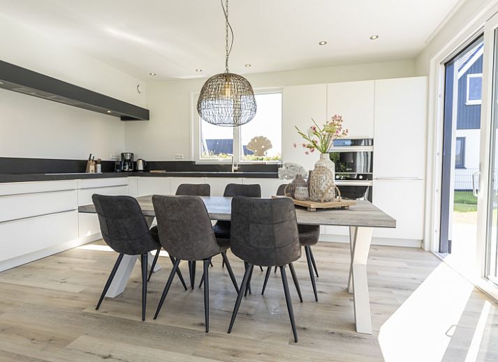 Villa 35a in De Koog, Texel with sunny terrace and trampoline in the garden.