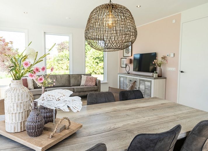 Modern vacation home Villa 35a in De Koog, Texel with spacious outdoor area.