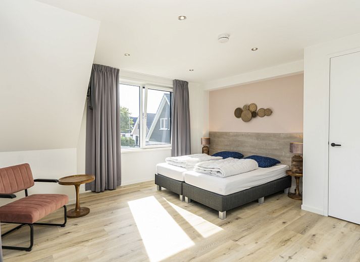 Stylish living room in Villa 35a, De Koog, Texel with lots of natural light.