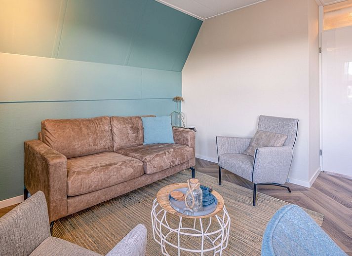 Cozy living room in Apartment Zeedistel 22, De Koog, Texel with modern interior and lots of light.