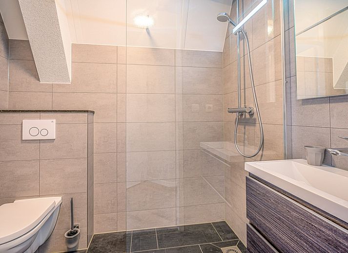 Spacious living room in Apartment Zeedistel 22, De Koog, Texel with modern furniture and cozy decor.