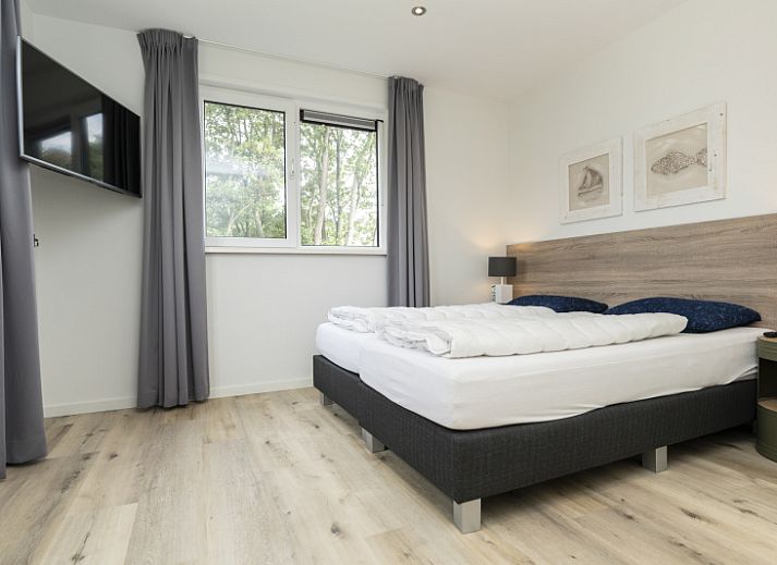 Villa 21A in De Koog, Texel, a modern vacation home with spacious garden and terrace on the Wadden Islands.