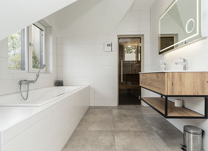 Bright living room of Villa 21A in De Koog, Texel, vacation home with stylish decor on the Wadden Islands.