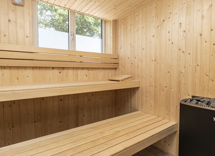 Bright living room of Villa 21A in De Koog, Texel, vacation home with stylish decor on the Wadden Islands.