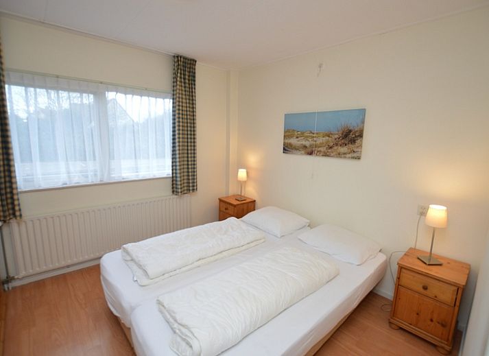 Cozy sitting area in Epelaan 19 vacation home, De Koog, Texel, with comfortable sofas.