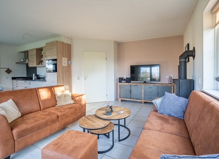 Maaikeduinweg 13 vacation home in De Koog, Texel with spacious garden and terrace, ideal for a relaxing stay on the Wadden Islands.