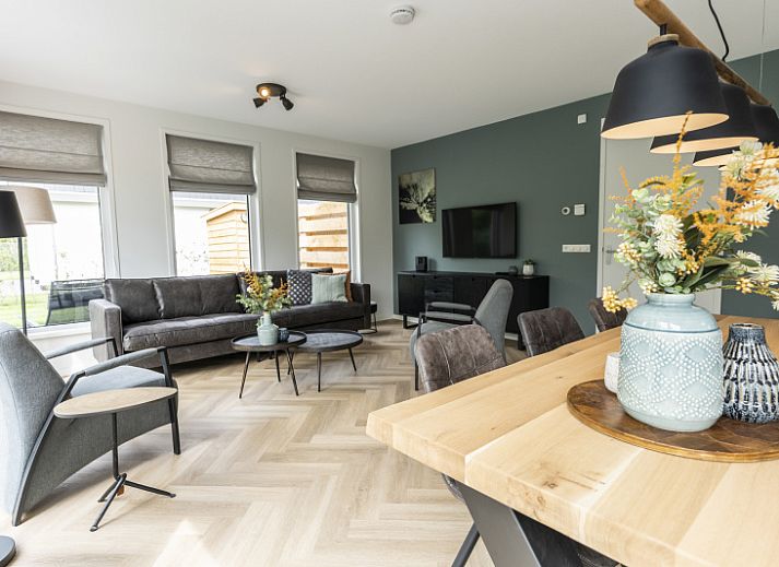 Villa 39 in De Koog, Texel, offers a spacious terrace with modern outdoor space for relaxation on the Wadden Islands.