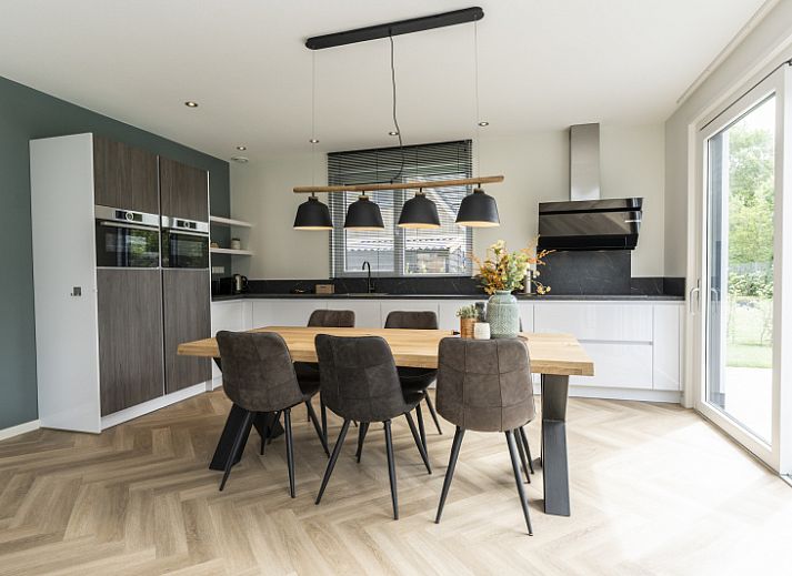 Villa 39 in De Koog, Texel, offers a spacious terrace with modern outdoor space for relaxation on the Wadden Islands.