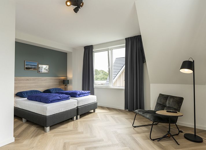 Cozy living room in Villa 39, De Koog, Texel. Comfortable vacation home interior on the Wadden Islands.