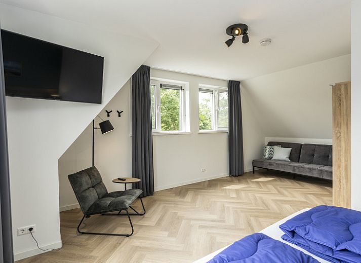 Cozy living room in Villa 39, De Koog, Texel. Comfortable vacation home interior on the Wadden Islands.