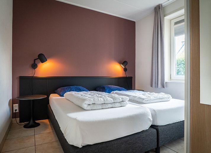 Stijlvolle woonkamer in Bungalow 15a, De Koog, Texel met comfortabele zitruimte.