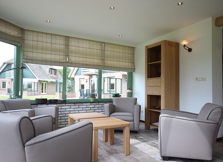 Villa with Conservatory in De Koog, Texel with charming exterior and green surroundings.