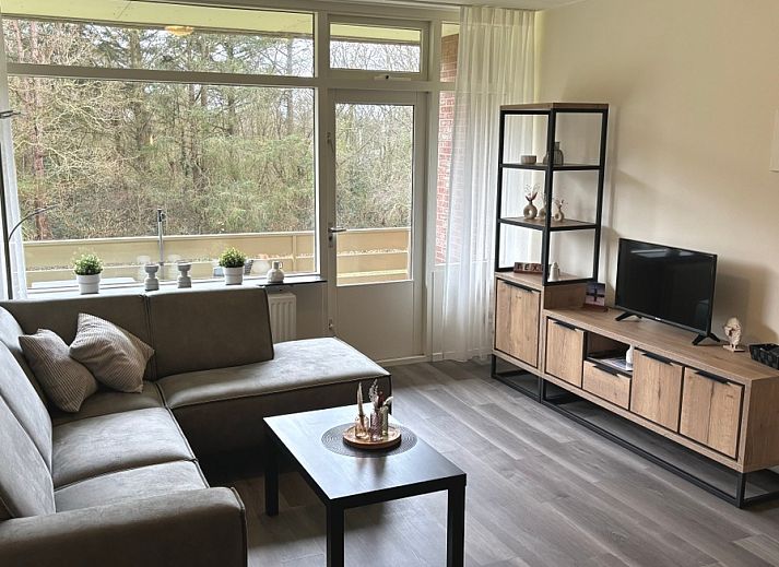 Cozy living room in Apartment Kerckeland 40, De Koog, Texel with a view of nature.