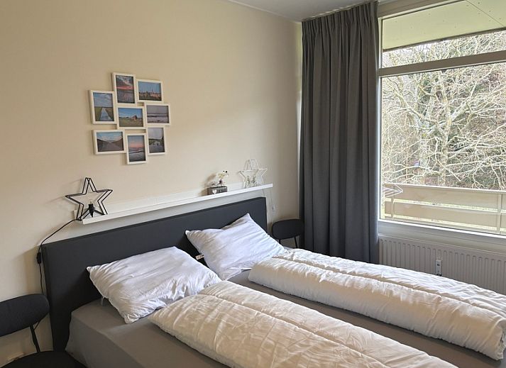 Comfortable sitting area in Apartment Kerckeland 40, De Koog, Texel with green surroundings.