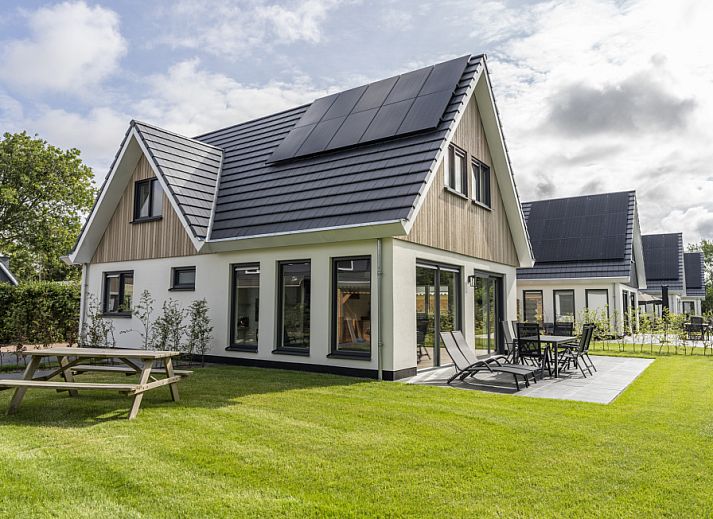 Villa 37 in De Koog, Texel, with spacious garden and terrace. Perfect vacation home on the Wadden Islands.