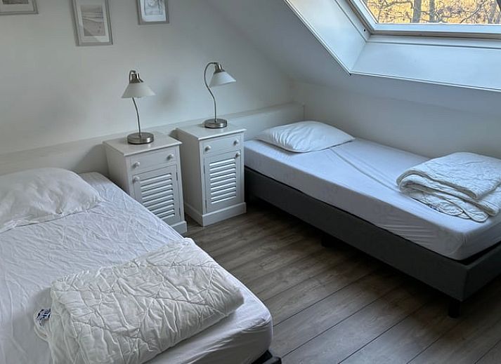 Cozy terrace of Cottage in De Koog on Texel, ideal for relaxing outdoor meals.