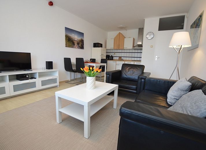 Cozy living room in Apartment Kerckeland 98, De Koog, Texel with comfortable seating and modern furnishings.