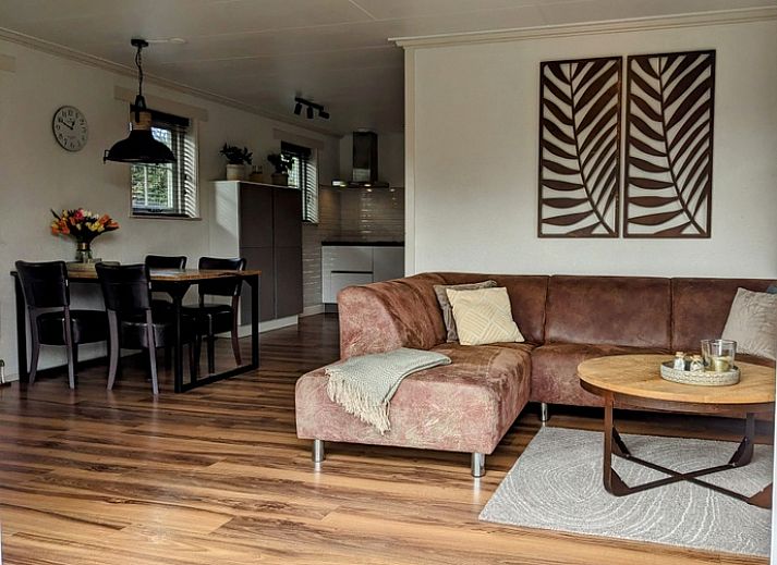 Spacious garden at D' Duinster vacation home in De Koog, Texel, surrounded by greenery on the Wadden Islands.